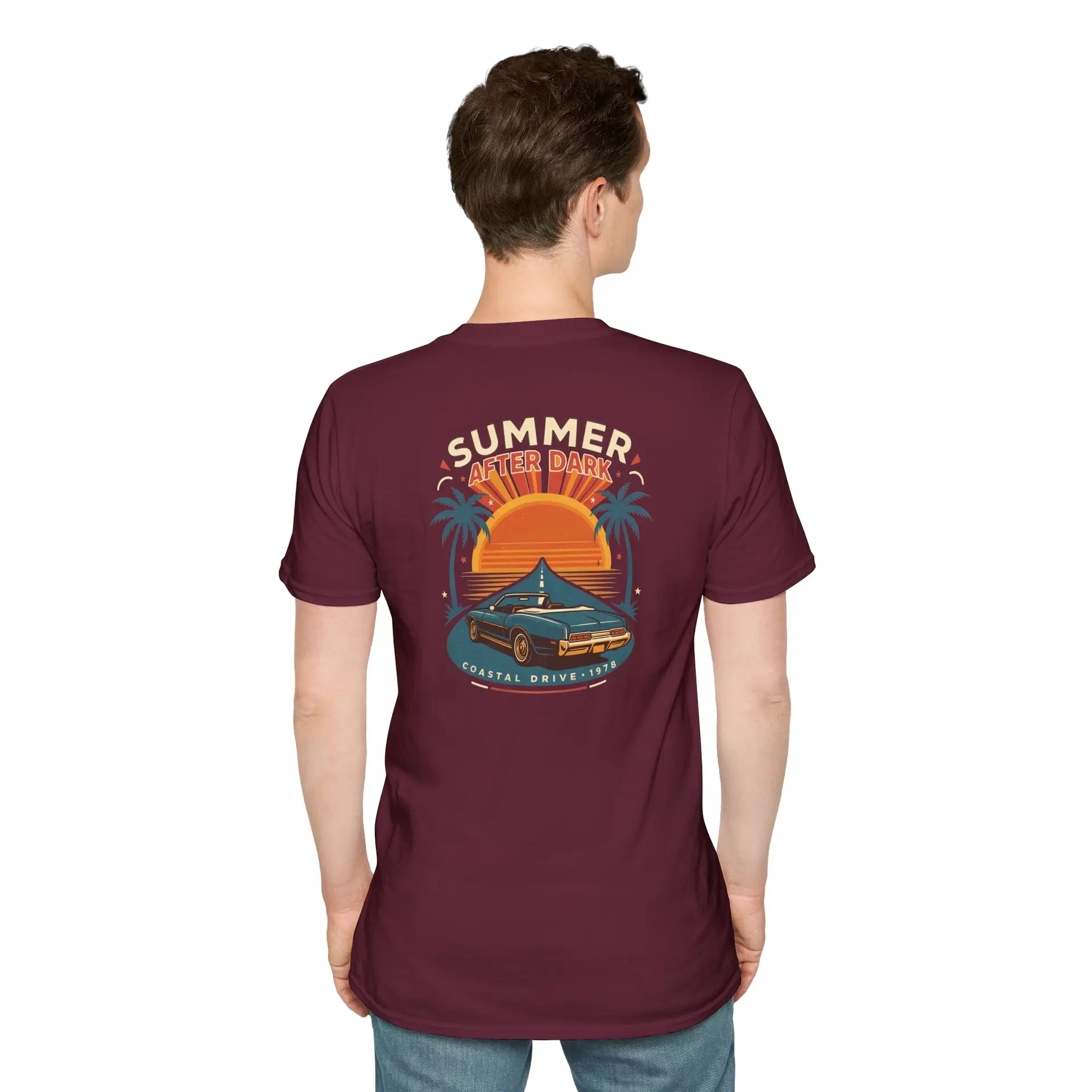 A retro summer road-trip graphic featuring a sunset, palm trees and classic car details, finished with Summer After Dark and Coastal Drive — 1979 lettering. A bold vintage-inspired addition to everyday streetwear.