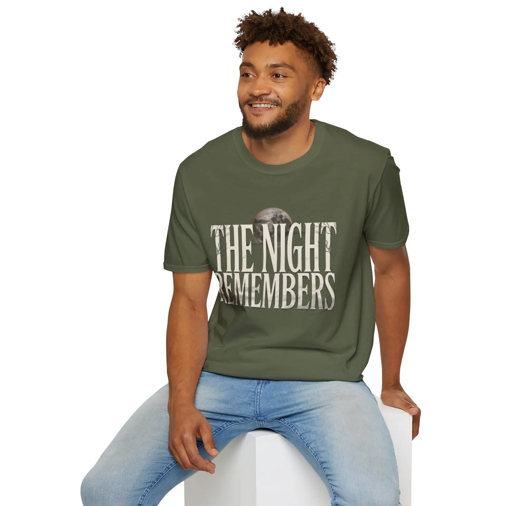 Front Mockup 1 The Night Remembers gothic moon graphic t-shirt featuring vintage typography, full moon, bats and haunted tree artwork. Front Mockup 2 Women's gothic Halloween graphic tee with The Night Remembers vintage moon design. Front Mockup 3 Vintage Halloween t-shirt with bold gothic typography and spooky moon artwork. Front Mockup 4 Dark aesthetic graphic t-shirt featuring The Night Remembers moon and haunted forest illustration. Back Mockup 1 Back view of The Night Remembers gothic Halloween t-shirt showing premium unisex fit. Back Mockup 2 Rear view of premium Gildan 64000 Halloween graphic tee from Brumbynorth. Close-up 1 Close-up of premium DTG printed gothic moon artwork on soft ring-spun cotton fabric. Close-up 2 Detailed close-up of The Night Remembers Halloween graphic showing crisp vintage typography and moon illustration.