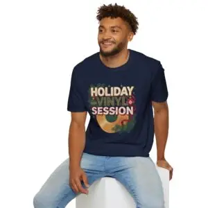 Front Images Holiday Vinyl Session retro Christmas record graphic T-shirt on female model Black Holiday Vinyl Session Christmas vinyl graphic tee front view Vintage Christmas music lover unisex T-shirt Retro vinyl record holiday graphic shirt Lifestyle Images Woman wearing Holiday Vinyl Session Christmas T-shirt in studio Casual festive outfit featuring Holiday Vinyl Session graphic tee Close-up Images Holiday Vinyl Session Christmas vinyl record graphic close-up Premium DTG printed retro holiday music design on black T-shirt