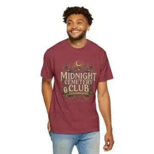 Front View Woman wearing a Comfort Colors Midnight Cemetery Club Halloween graphic t-shirt featuring vintage gothic typography, moonlit cemetery artwork, and a relaxed garment-dyed fit. Lifestyle Alt Text Premium Comfort Colors 1717 garment-dyed Halloween t-shirt with Midnight Cemetery Club vintage cemetery design, photographed on a female model in a casual lifestyle setting.
