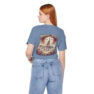 Midnight Society Gothic Halloween graphic t-shirt featuring vintage moon and bat front design. Bella+Canvas Midnight Society Halloween t-shirt with gothic front print on premium unisex cotton tee. Front view of Midnight Society spooky season graphic tee with moon, bats and vintage gothic typography. Premium Halloween graphic t-shirt with minimalist Midnight Society front artwork for autumn fashion. Back Images (2) Back view of Midnight Society Halloween t-shirt featuring large moonlit cemetery, gothic church and vintage horror artwork. Oversized gothic Halloween back graphic with cathedral, moon, ravens and vintage cemetery illustration on Bella+Canvas tee. Close-Up Images (2) Close-up of premium DTF printed Midnight Society graphic showing detailed gothic artwork and sharp vintage typography. Detailed close-up of moonlit cemetery Halloween print with distressed gothic illustration on soft Bella+Canvas cotton t-shirt