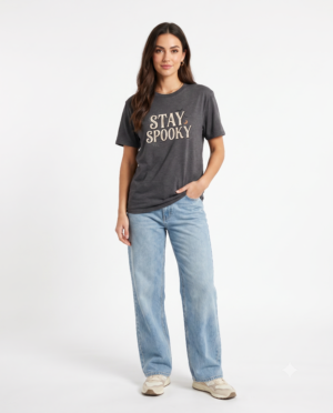 A black Stay Spooky Halloween t-shirt featuring a retro script chest graphic with subtle Halloween accents.