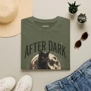 Halloween black cat T-shirt design featuring a full moon, gothic “After Dark” typography, crescent moon detail, and vintage October artwork.