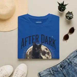 Halloween black cat T-shirt design featuring a full moon, gothic “After Dark” typography, crescent moon detail, and vintage October artwork.