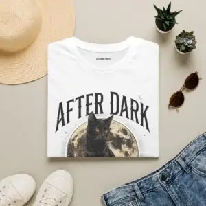 Halloween black cat T-shirt design featuring a full moon, gothic “After Dark” typography, crescent moon detail, and vintage October artwork.