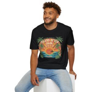Model wearing the Island After Dark unisex T-shirt with a retro tropical sunset, palm tree and ocean graphic on the back in a studio Short Product Text A retro tropical graphic tee built around the Island After Dark mood, with a sunset, ocean waves and palm leaves. Lightweight, unisex and easy to style for relaxed everyday looks.